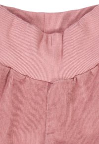 Pink corduroy fabric with a ribbed texture, featuring a wide, elastic waistband and pleated detailing at the bottom.