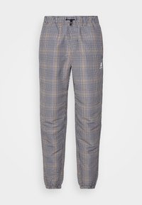Checkered pants in blue, black, and yellow with an elastic waistband and cuffed ankles; lightweight fabric, featuring a small logo detail.