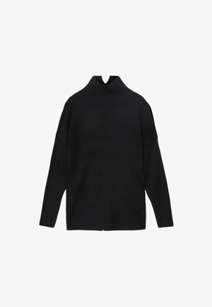 Musta neulepusero, jossa on korkea ribbikaarroke, roikkuvat olkaimet sekä ribbikuviointi helmassa ja hihojen resoreissa.