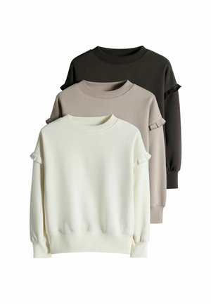 Drei Sweatshirts mit langen Ärmeln in Schwarz, Beige und Weiß, jeweils mit Rüschen-Details an den oberen Ärmeln sowie gerippten Bündchen und Halsabschlüssen.