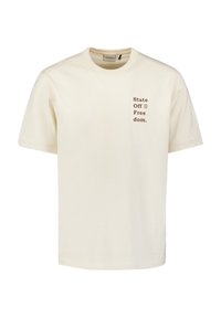 Crème katoenen t-shirt met een ronde hals, korte mouwen en bruine tekst "State Off = Free dom." op de linkerkant van de borst. Klassieke pasvorm.
