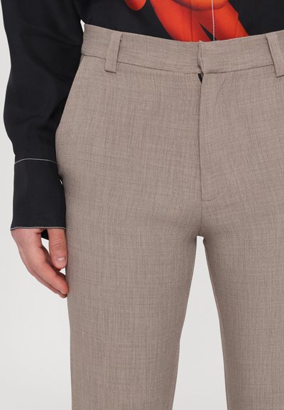 Beige tailored trousers with a textured fabric, featuring a straight fit, belt loops, and a concealed zipper closure.