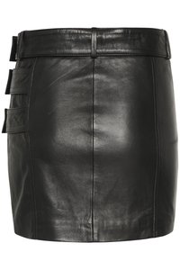 Black leather mini skirt featuring a smooth texture, vertical seams, and three side pockets with a simple, structured waistband.