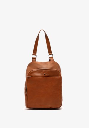Brown leather backpack with a structured shape, featuring a front zip pocket, adjustable straps, and decorative silver star accents.