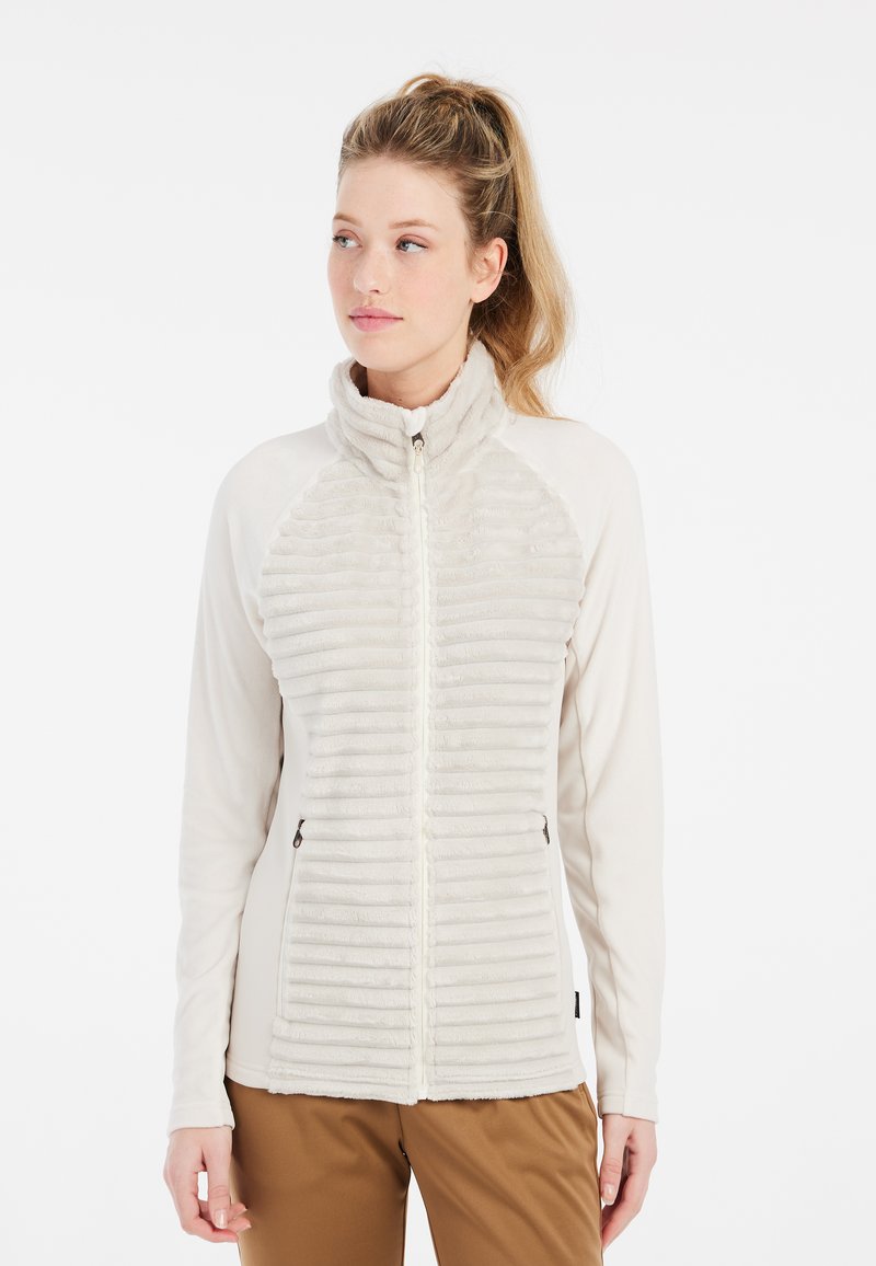 Svetlý fleece kabát s hrebeňovým predným dielom, vysokým golierom, zipsovým uzáverom a bočnými vreckami. Mäkka textúra a dlhé rukávy.