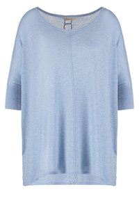 Jasnoniebieska, oversize krótka bluzka z krótkim rękawem, wykonana z lekkiego materiału. Posiada okrągły dekolt i pionową szew na środku.