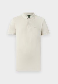 Polo manches courtes de couleur crème avec col et deux boutons, avec un logo discret "BOSS" sur la poitrine gauche.