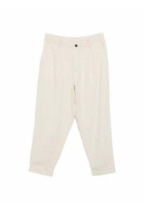 Kremowe spodnie z wysokim stanem, zamkiem i guzikiem, szlufkami na pasek, bocznymi kieszeniami oraz zwężanymi nogawkami.