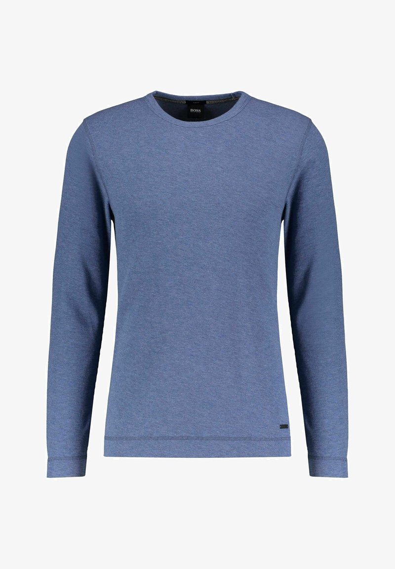 Blå långärmad t-shirt med rund halsringning, tillverkad av strukturerad tyg. Har en ribbad halsringning och en liten svart logotyp vid kanten.