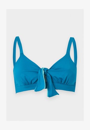 Μπλε τοπ μπικίνι με λεπτές τιράντες και κόμπο μπροστά, με ελαφρύ σούρωμα κάτω από τα cups για σχήμα.