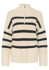 Pull en maille crème avec rayures horizontales noires, col montant et fermeture éclair partielle à l'avant.