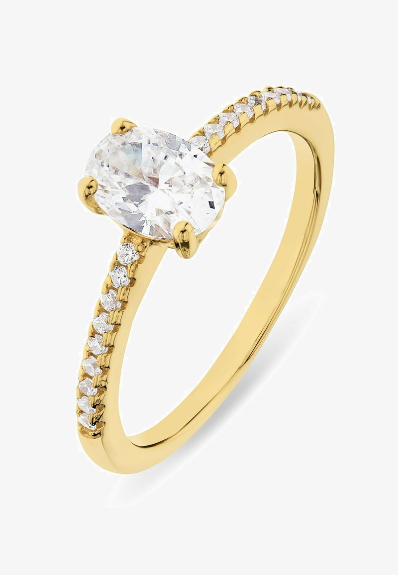 Gold ring with an oval clear gemstone in a four-prong setting, featuring a narrow band adorned with small clear accent stones.