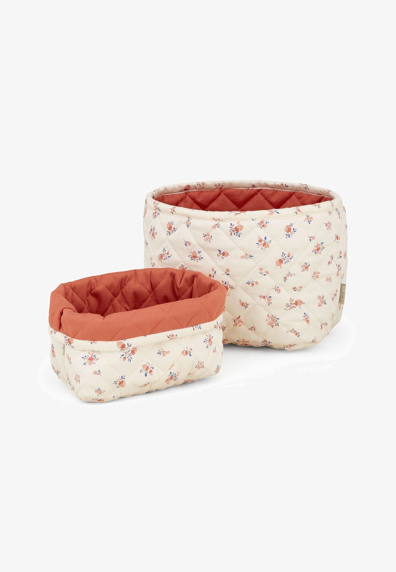Quilted fabric storage baskets, one larger and one smaller, with a cream background and floral pattern, accented with terra cotta interiors.