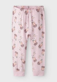Pantalons de pyjama pour enfants rose, fabriqués à partir d'un tissu doux, présentant un motif cartoon répété de personnages, de lunes et d'étoiles. Taille élastique.