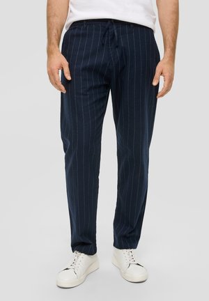 - Spodnie materiałowe