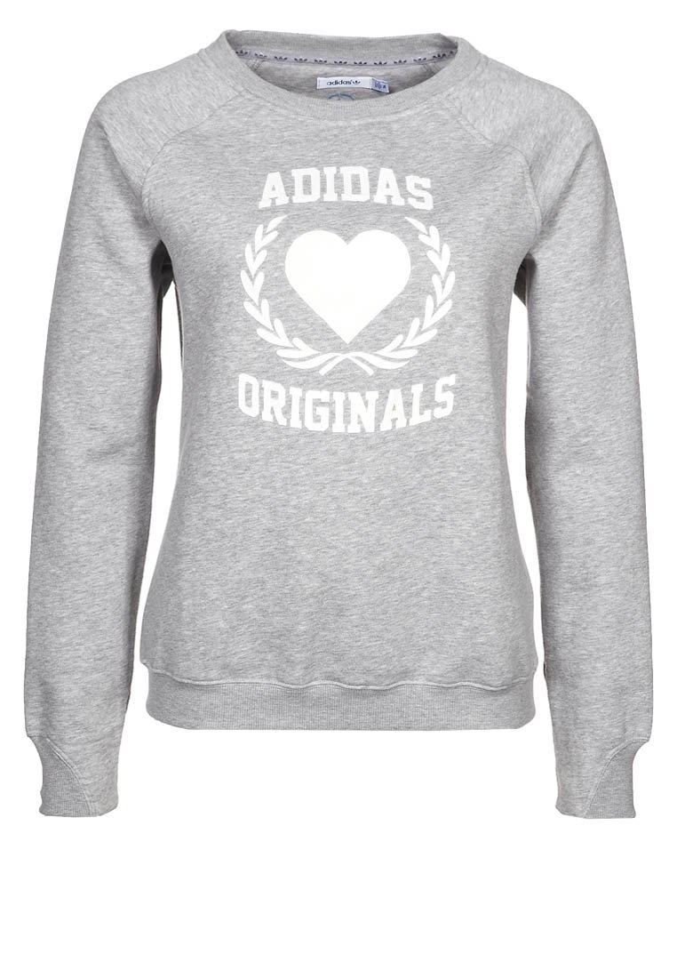 Grå Adidas Originals sweatshirt med vit hjärta och lagerkransdesign på framsidan, rund hals, och långa ärmar.