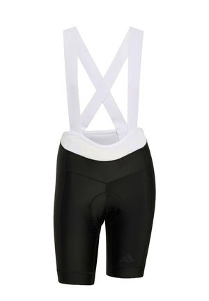 Schwarze Radsporthosen mit weißen kreuzenden Trägern, gepolsterter Sitzfläche, glatter Textur und dezentem Logodetail unten links.