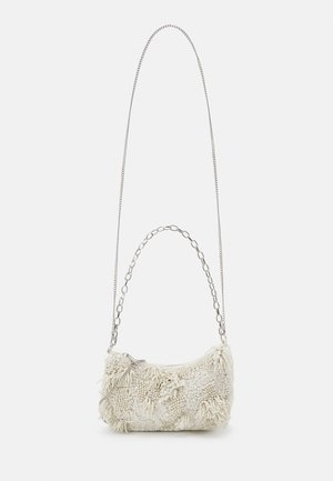 Small white textured handbag with sequin and fringe details, featuring two silver chain straps: one thin and one chunky.
