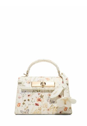 White handbag with floral and butterfly print, gold-tone clasp, top handle, and attached white flower-shaped charm labeled ALDO.