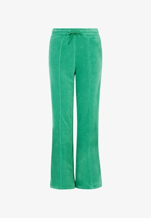 Groene fleecebroek met een tailleband met trekkoord, uitlopende benen en subtiele stikdetails. Zachte textuur en comfortabele pasvorm.