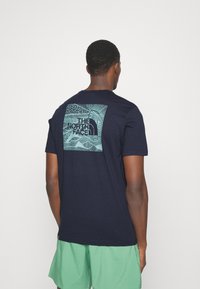 The North Face Triko s potiskem - dark blue