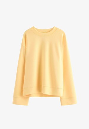 Enkelt lysegul langærmet sweatshirt med rund hals og ribstrikkede manchetter og kant, vist på en hvid baggrund.