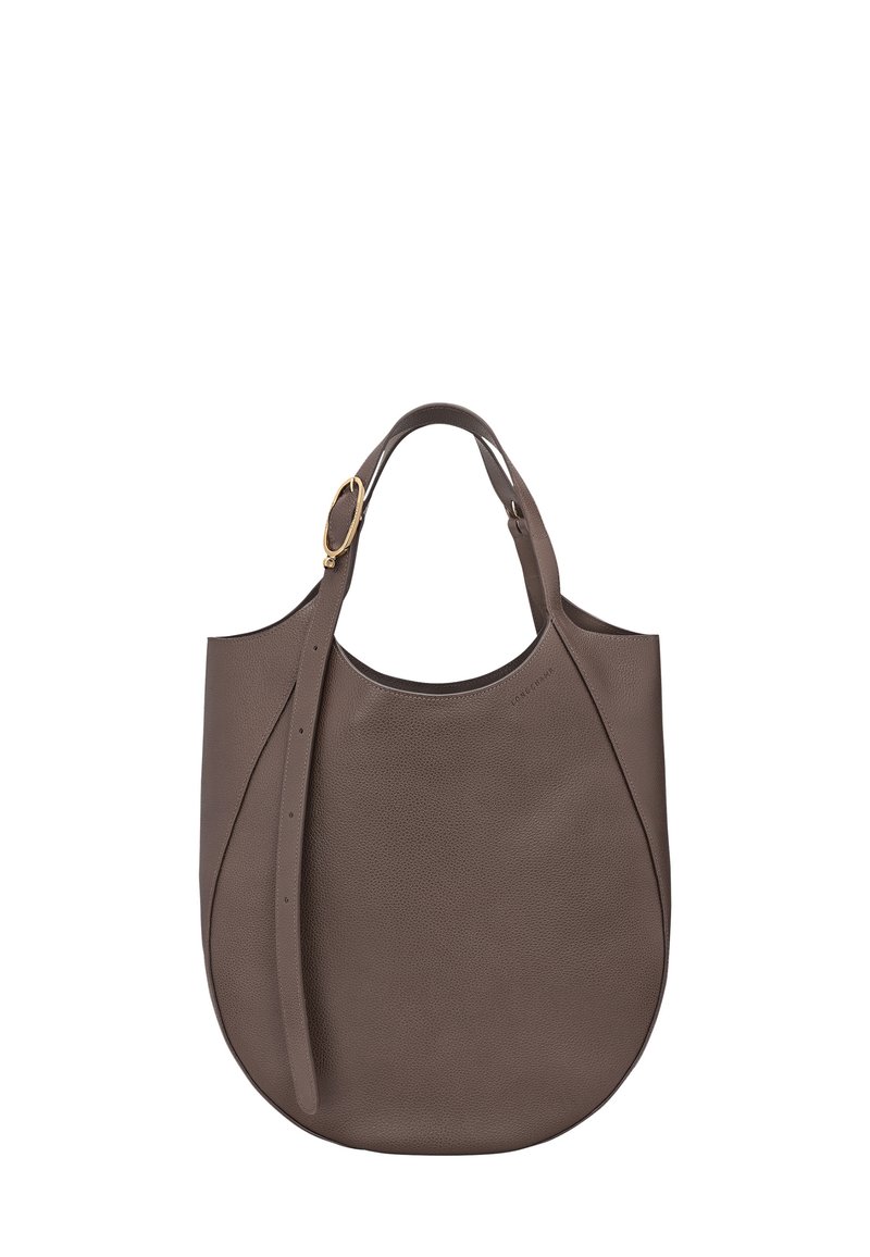 Brown textured leather shoulder bag with a curved shape, adjustable strap, and gold buckle detail on a white background.