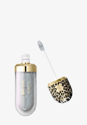 Contenant brillant argenté pour gloss à lèvres avec bouchon doré et applicateur imprimé léopard, noms des marques Just Cavalli et KIKO visibles.