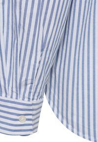 Striped shirt featuring blue and white vertical stripes, cotton material, and a buttoned cuff with a curved hem for a relaxed fit.