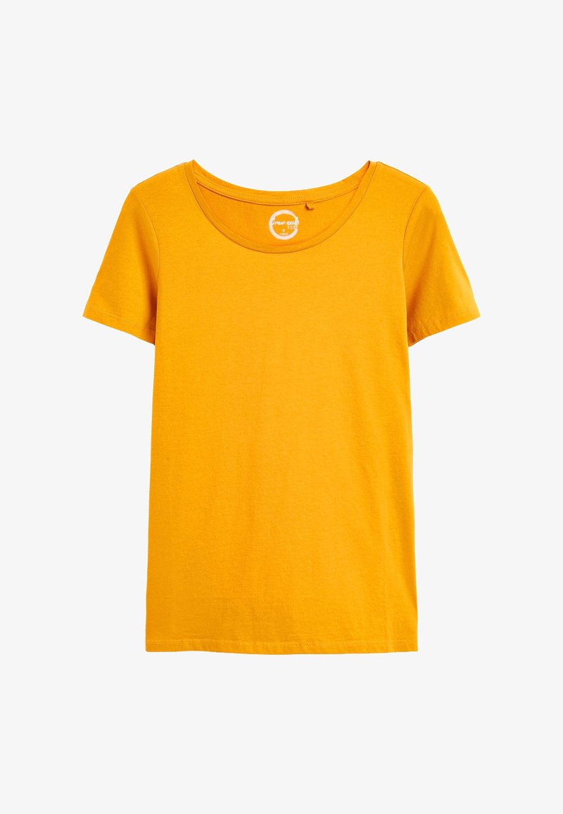 T-shirt en coton jaune moutarde uni, manches courtes, col rond, posé à plat sur un fond blanc.