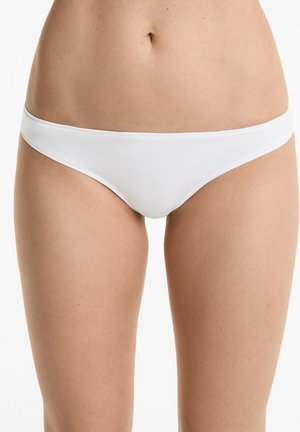 Witte katoenen bikini-slip met een gladde textuur en een elastische tailleband. Kenmerkt zich door een klassiek, minimalistisch ontwerp.