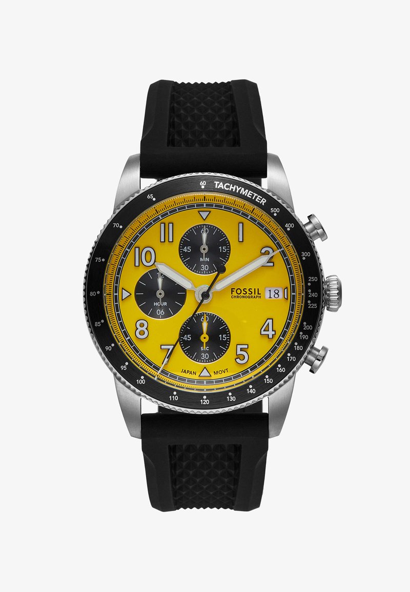 Ρολόι χρονογράφος Fossil με κίτρινο καντράν, τρία μαύρα υποκαντράν, μεγάλους μαύρους και λευκούς δείκτες ωρών, μαύρο λουρί από καουτσούκ και ατσαλένιες λεπτομέρειες.