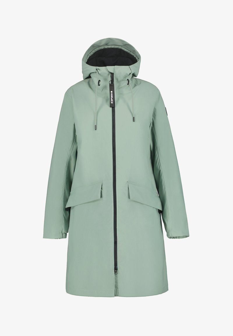 Hellgrüner wasserdichter Jacke mit Kapuze, Frontreißverschluss, zwei Klapptaschen und verstellbarem Kordelzug. Glatte Textur und schlichtes Design.
