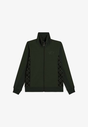 Veste zippée vert foncé avec col montant, panneaux latéraux noirs à motifs, et logo discret sur le côté gauche de la poitrine.