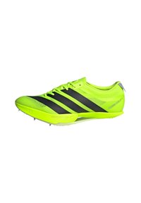 Lightweight yellow and black athletic shoe with a mesh upper, three signature black stripes, and rubber spikes on the outsole for traction.