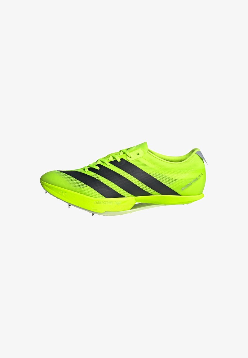 Lightweight yellow and black athletic shoe with a mesh upper, three signature black stripes, and rubber spikes on the outsole for traction.