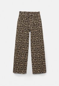 Pantalon à jambes larges avec imprimé léopard marron et noir et cordon à nouer à l'avant sur fond blanc.