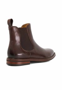 Brown leather Chelsea boot with elastic side panels, a rounded toe, and a wooden-styled layered sole. Smooth texture, sleek design.