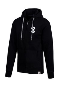 Zwarte rits hoodie gemaakt van zachte stof, met een wit logo op de borst, een ruitjes trekkoord en voorzakken.