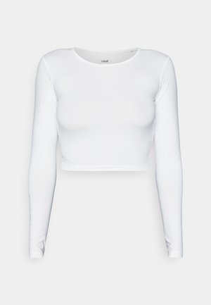 White long-sleeve crop top made from a smooth, stretchy material featuring a round neckline and fitted silhouette. Minimalist design.