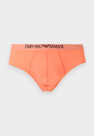 Πορτοκαλί ανδρικά εσώρουχα με το λογότυπο Emporio Armani στη μέση, με ραμμένες λεπτομέρειες και απαλό ύφασμα.