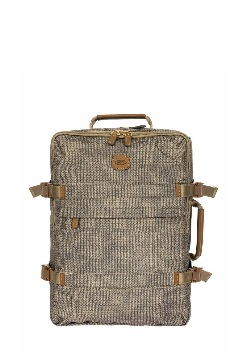 Sac à dos en tissu texturé beige et marron, avec des accents beige, deux sangles latérales réglables et une poignée supérieure pour le transport.