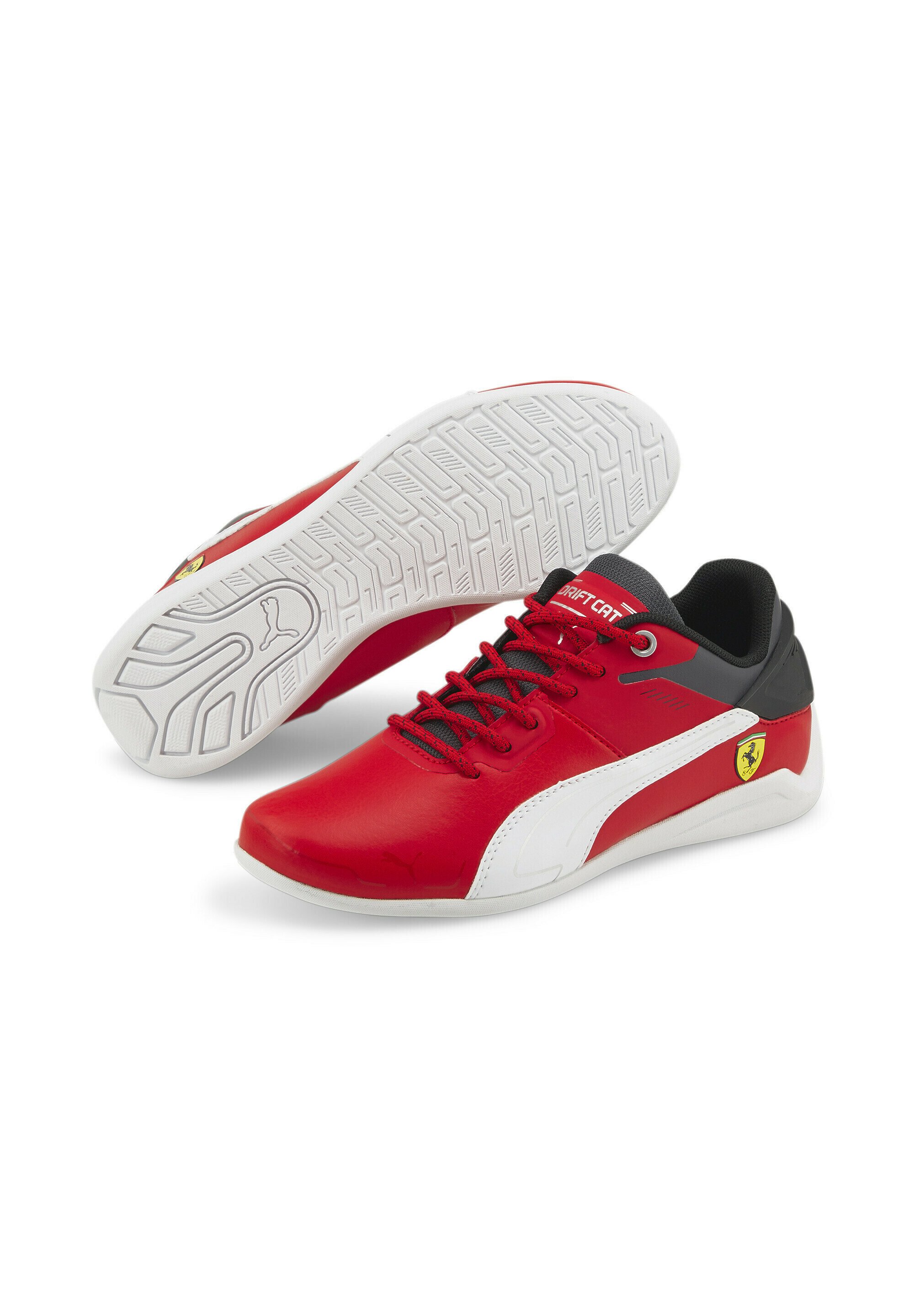 red ferrari trainers