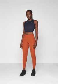 Peak Performance LIGHTWEIGHT - Leggings - spiced