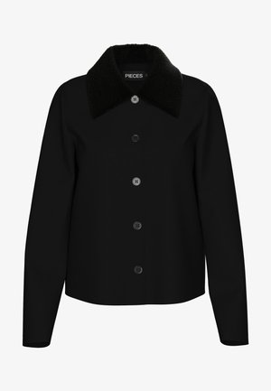 Must vest, mille musta kraega, kuue nupuga esiosa, pikad varrukad ja lühikese disainiga. Sile tekstuur ja lihtne siluett.