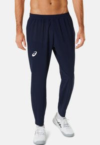 ASICS MATCH PANT Pantalon de survêtement midnight/bleu