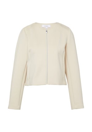 Giacca color crema a maniche lunghe con cerniera frontale e scollo rotondo, caratterizzata da un design pulito e minimalista.