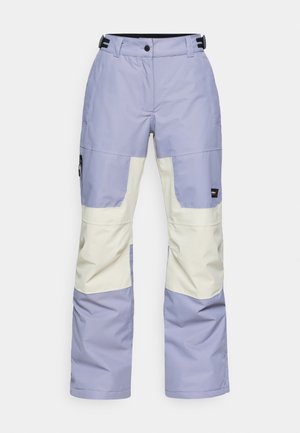 Lila és krém színű sínadrág, laza szabással, oldalzsebekkel, gombos záródással és állítható derékrésszel.