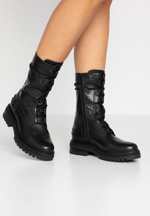 Botines con plataforma - black