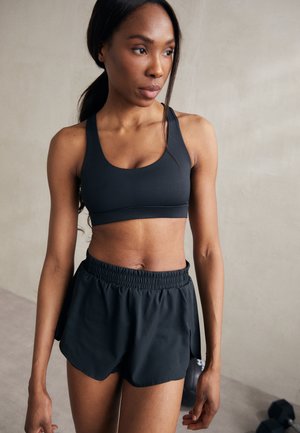 Girlfriend Collective FLOAT ELLA SCOOP BRA - Sport-BH mit mittlerer Stützkraft - black